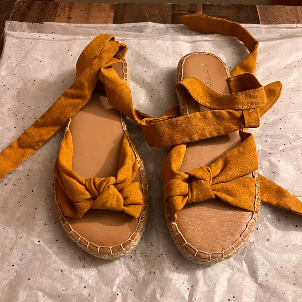Old Navy size 8.5 strappy tie sandals.